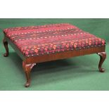 Large mahogany framed foot stool having carpet covered upholstered top and standing on cabriole legs