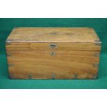 Camphor wood brass bound chest having side carrying handles and opening to reveal storage space -