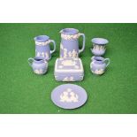 Group of Wedgwood Jasperware pale blue porcelain to comprise: pair of small jugs, commemorative