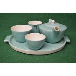 Poole Pottery green glazed tea-for-one set to comprise: teapot, milk jug, sugar bowl and teacup