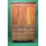 19th century mahogany linen press having moulded cornice over two panelled doors opening to reveal