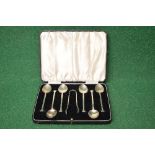 Cased set of six silver teaspoons with matching sugar tongs, marked for Birmingham Please note