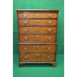 19th century oak chest on chest the top having moulded edge over four long graduated drawers with