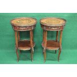 Pair of 20th century mahogany inlaid two tier occasional tables the tops having brass pierced