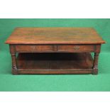20th century oak coffee table having rectangular top over two drawers to either side with brass