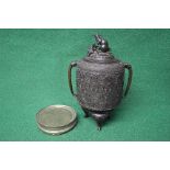 Oriental bronze two handled lidded urn the lid having mouse and fruit finial, the cylindrical body