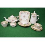 Tuscan china teaset having floral decoration with gilt borders on a white ground to comprise: