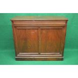 Mahogany side cabinet having lift top with rounded corners opening to reveal storage space over