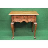 19th century oak lowboy the top having chamfered edge over single small central drawer flanked by