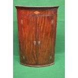 19th century mahogany bow fronted wall hanging corner cupboard having inlaid decoration of shell