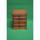 Oak table top chest of drawers the top having chamfered edge over four long graduated drawers with