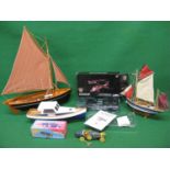 Mixed lot of three wooden model boats, clockwork tinplate Bugatti 35 and a Tech-team radio