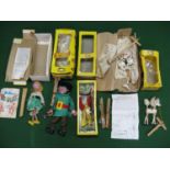 Group of five Pelham Puppets to comprise: Skeleton in brown cardboard box, Foal in yellow window