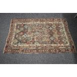 Brown ground rug having cream and black pattern - 1.53m x 1.05m Please note descriptions are not