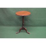 19th century mahogany circular occasional table the top being supported on a turned column leading