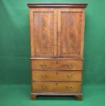 19th century mahogany linen press the top having two panelled doors opening to reveal converted