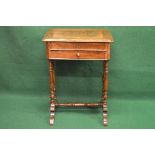 19th century walnut work table having shaped top over two drawers, standing on turned stretchered