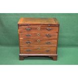 19th century mahogany chest of drawers having brushing slide over four long graduated drawers,