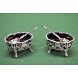 Pair of silver salts having blue glass liners, marked for London together with a pair of silver gilt