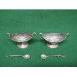 Pair of silver two handled salts having matching spoons with twist stems, marked for London and