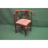 19th century mahogany corner chair having curved back supported by outward tapering columns and
