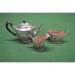 Silver three piece teaset to comprise teapot, sugar bowl and milk jug, marked for Sheffield and