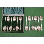 Set of six silver coffee spoons having twisted stems, marked for Birmingham together with a set of