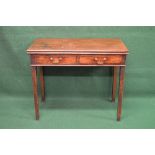 19th century mahogany fold over tea table the top opening to reveal polished surface over two