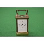 J Horton & Son, London, brass cased carriage clock having white dial with black Roman Numerals and