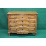 20th century walnut bow fronted chest of four long graduated drawers, standing on cabriole legs with