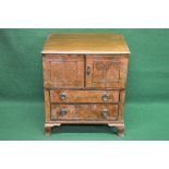 19th century mahogany converted commode having two doors over two drawers with brass handles,