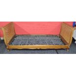 Late 20th century Bergere single sleigh bed having double caned head and foot boards and metal