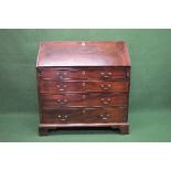 Georgian mahogany bureau having fall front opening to reveal fitted interior of pigeon holes and