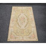 Wall hanging embroidery/rug having a pale mustard ground with floral pattern - 59.5" x 39.5"