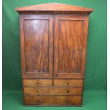 19th century mahogany linen press the top having two panelled doors opening to reveal four pull