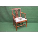 Georgian mahogany open elbow chair having carved top rail and pierced back splat supported by
