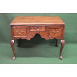 19th century oak lowboy having single central drawer flanked by single drawers, standing on cabriole