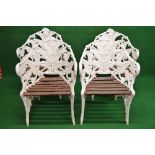 Set of four metal Coalbrookdale style garden armchairs in a fern leaf design and having wooden slats