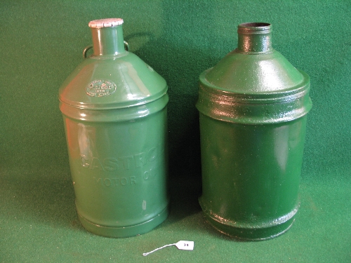 Two large conical topped oil drums with wide necks, one embossed Castrol Motor Oil and has '10.75'