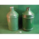 Two large conical topped oil drums with wide necks, one embossed Castrol Motor Oil and has '10.75'