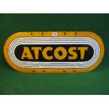 Enamel sign for Atcost (the farm building erector), orange letters on a black ground with white,