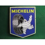 Shield shaped enamel Michelin sign featuring a jolly Bibendum and ZX tyre, white, black and yellow
