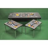 Set of three mid century tile top coffee tables the tiles set in black metal frame and standing on