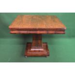 19th century centre table having square top with rounded corners and moulded frieze supported on a