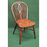 19th century yew wood wheelback Windsor chair with elm saddle shape seat on turned legs and