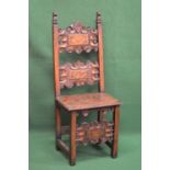 19th century hall chair having high back with carved and inlaid back panels over solid seat and