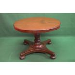 Circular mahogany tip top centre table the top supported on bulbous column leading to quad form base