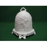 Minton white glazed cheese dome in the form of a beehive with black berries, standing on square form