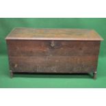 Oak coffer the top having moulded edge opening to reveal storage space, the front carved with