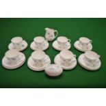 Set of eight Wedgwood Ice Rose pattern tea cups, saucers and side plates together with matching milk